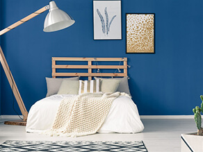 Minimalist Navy Blue Bedroom With Giant Lamp